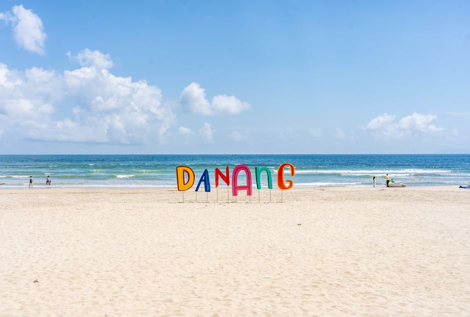 Bright and sunny day at Da Nang beach in Vietnam with clear skies and a calm sea. (photo by Pragyan Bezbaruah on Pexels)