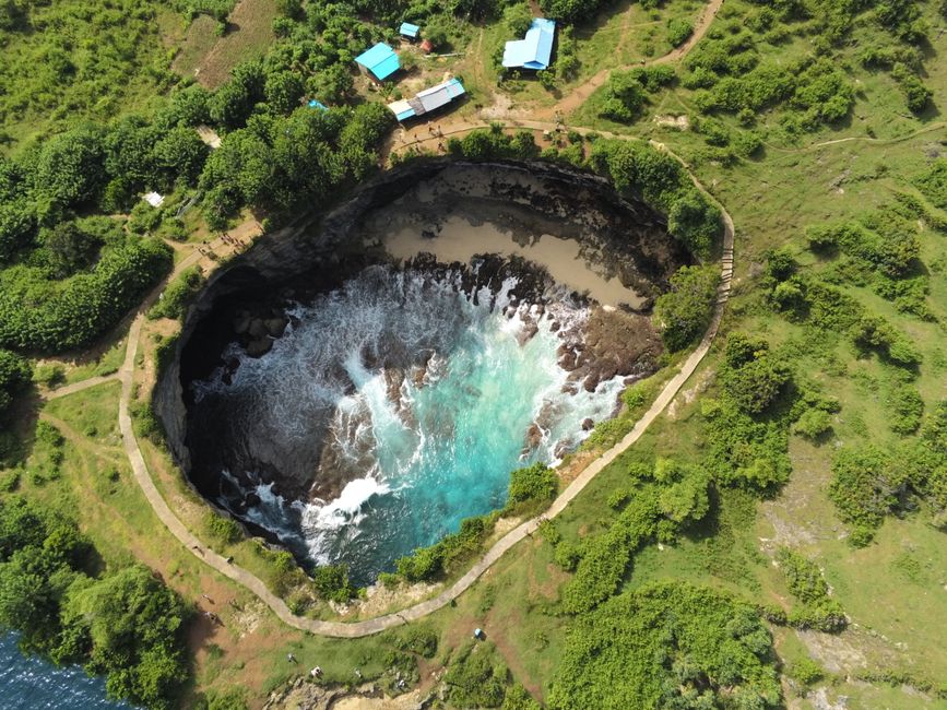 A breathtaking aerial view of Angel's Billabong in Nusa Penida, Bali showcasing vibrant turquoise waters in a rocky inlet. (photo by herve gryczka danthony on Pexels)